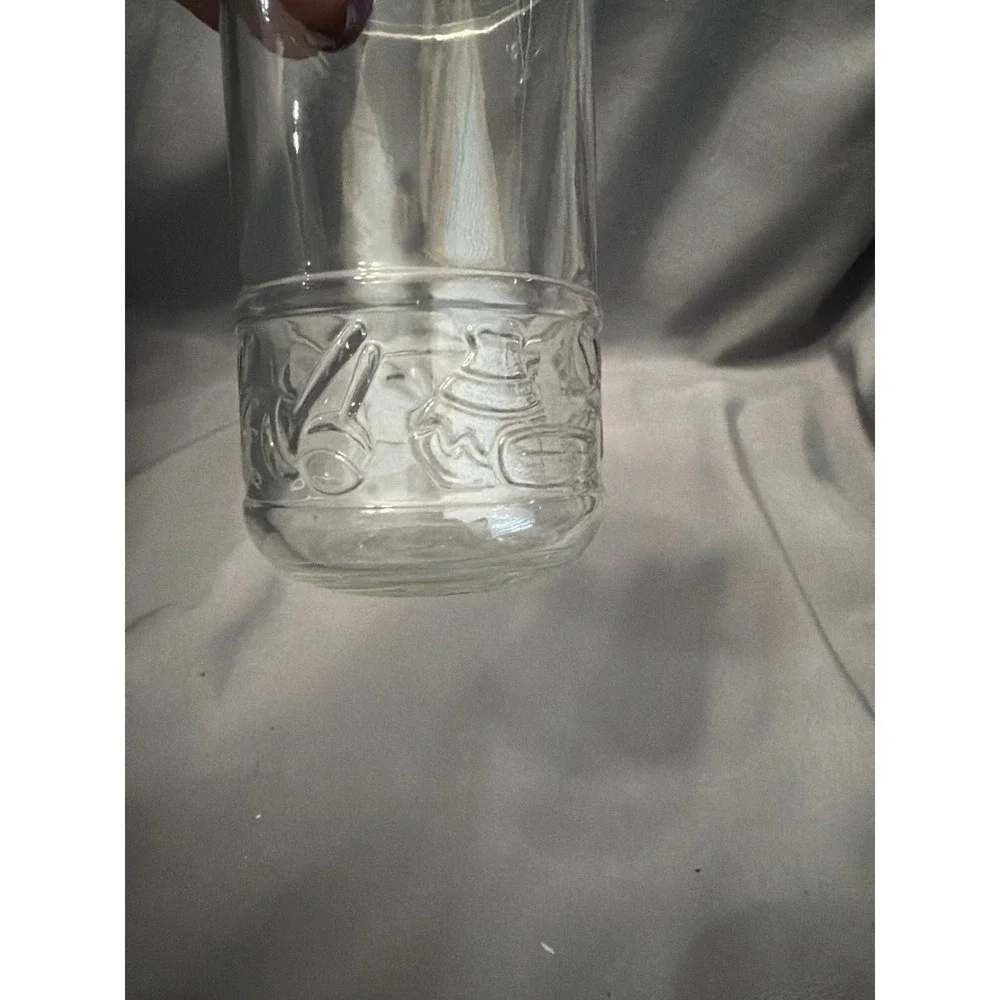 Vintage Clear Glass Jar Embossed Cultural Symbols Figures 15 I 77 Marked Base